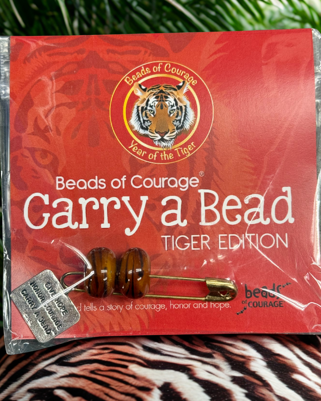 Tiger Carry A Bead