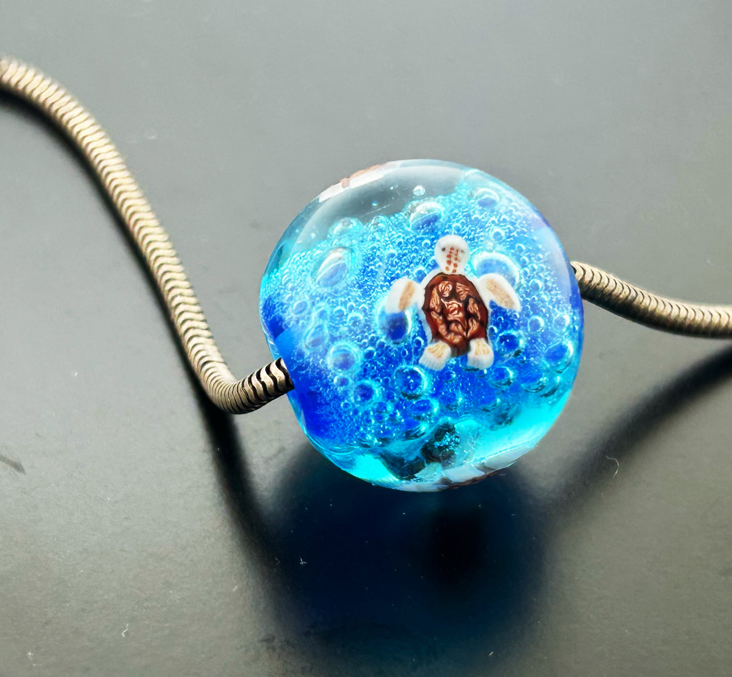 February 2025 Bead of the Month - The Sea Turtle Bead is filled with luck, protection, endurance, wisdom, and strength!