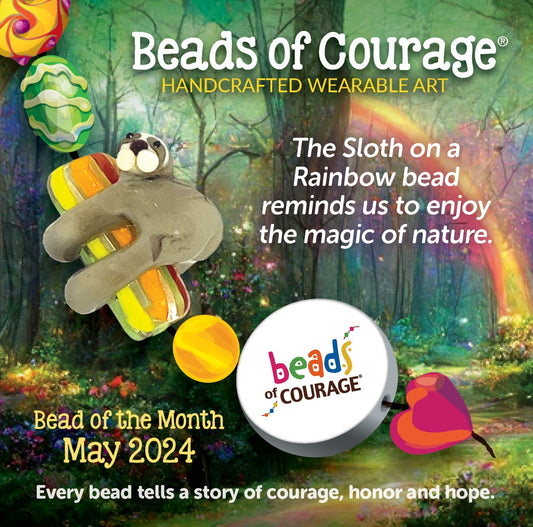 Beads of Courage, May 2024 Bead of the Month - The Sloth on a Rainbow bead reminds us to enjoy the magic of nature 